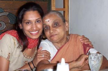 Suguna with her granddaughter